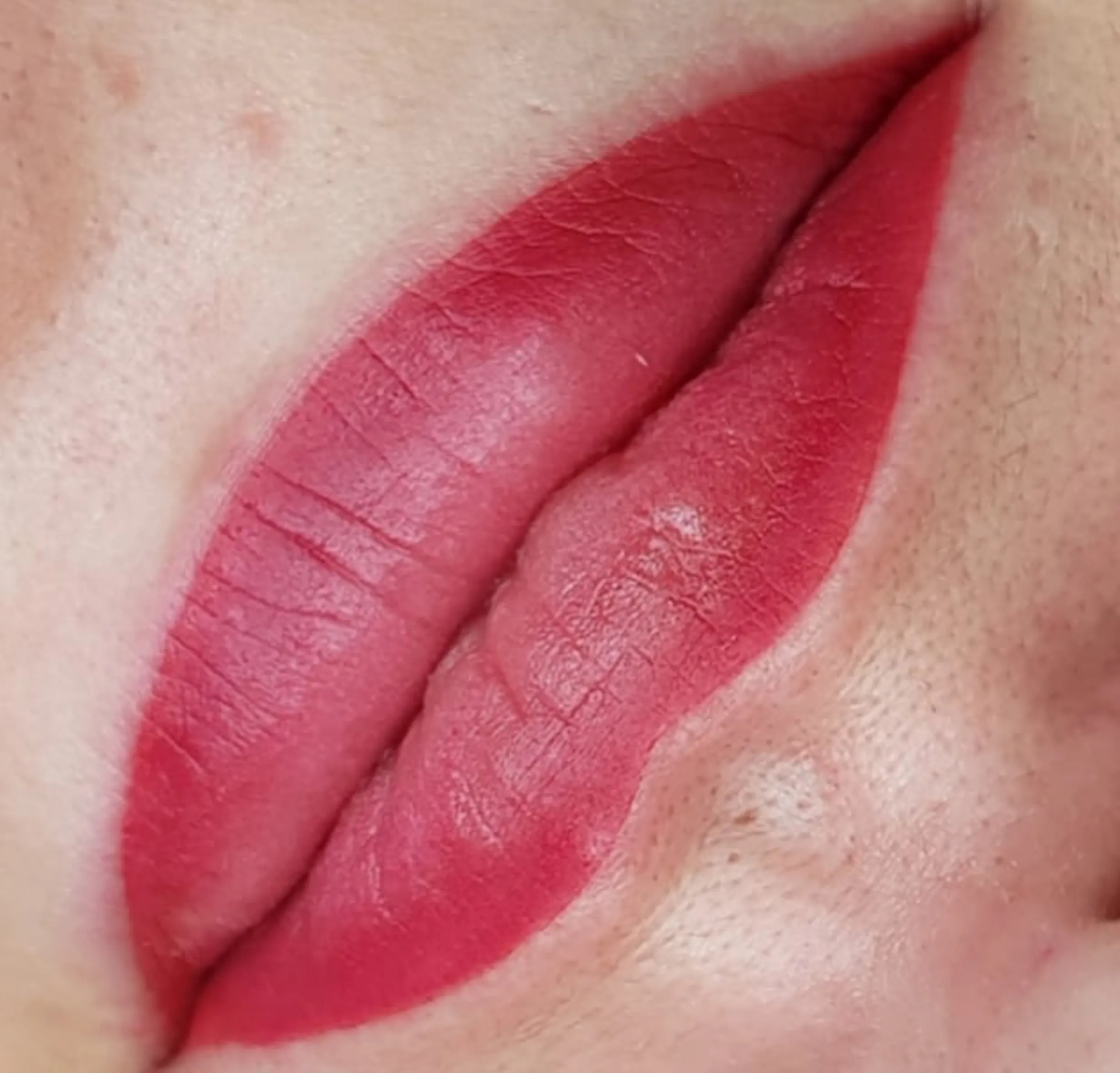 avoid fading lip tattoo
